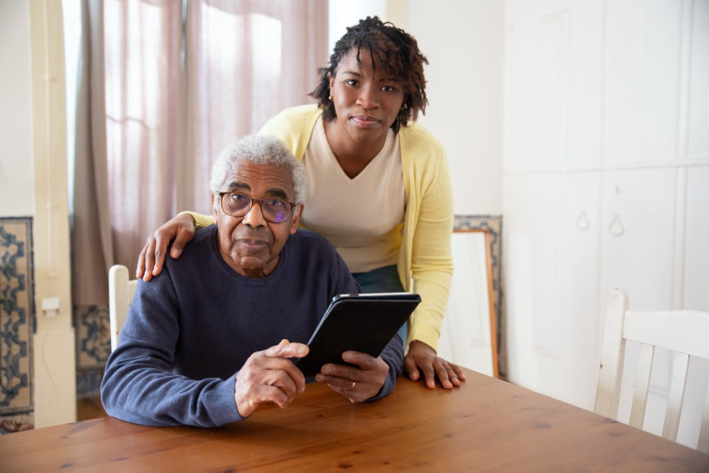 : A senior with their caregiver.