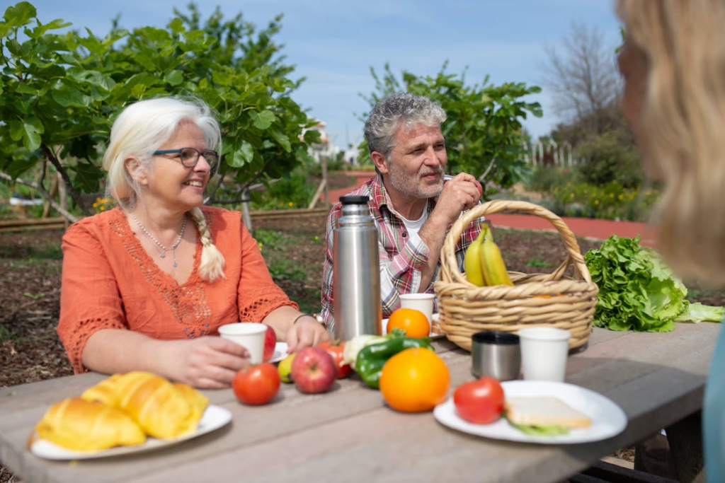 Seniors eating fruits and vegetables.