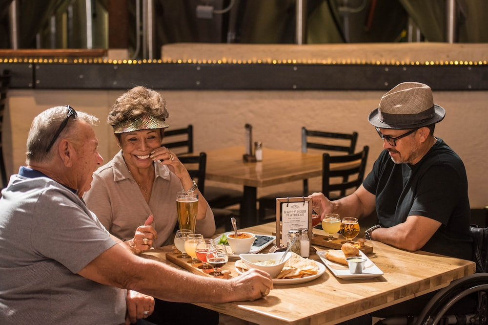 older adults having dinner together