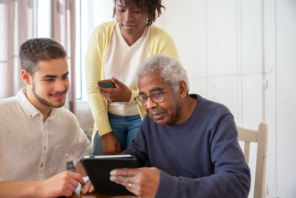  man looking at a tablet.