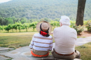 two seniors sitting together.