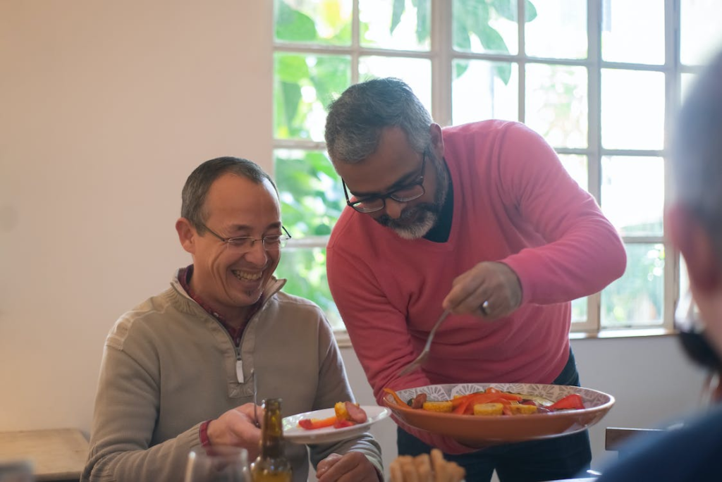 A pair of senior friends enjoying a meal together