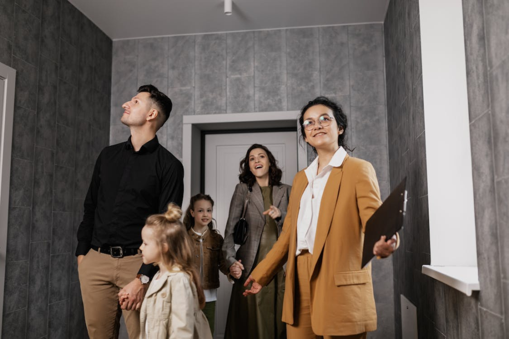 An advisor showing a family a house in a senior living community