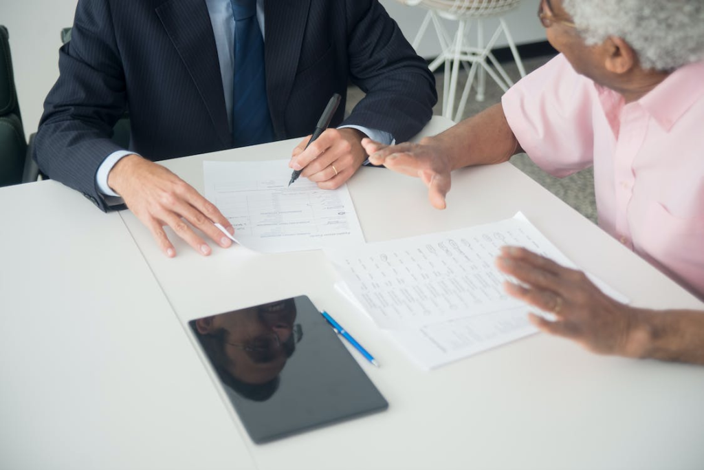 A senior talking to a financial advisor