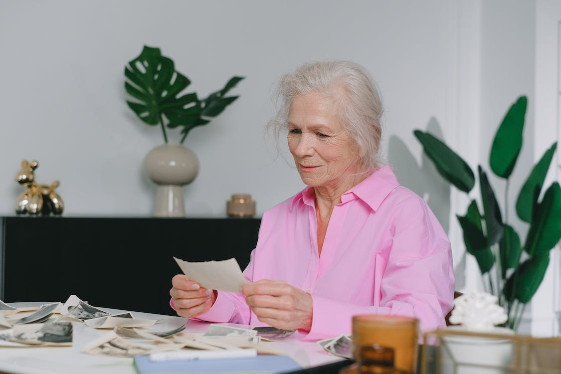 senior looking at photos.