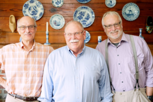 three seniors smiling