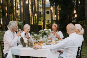 A group of seniors sitting at a dining table