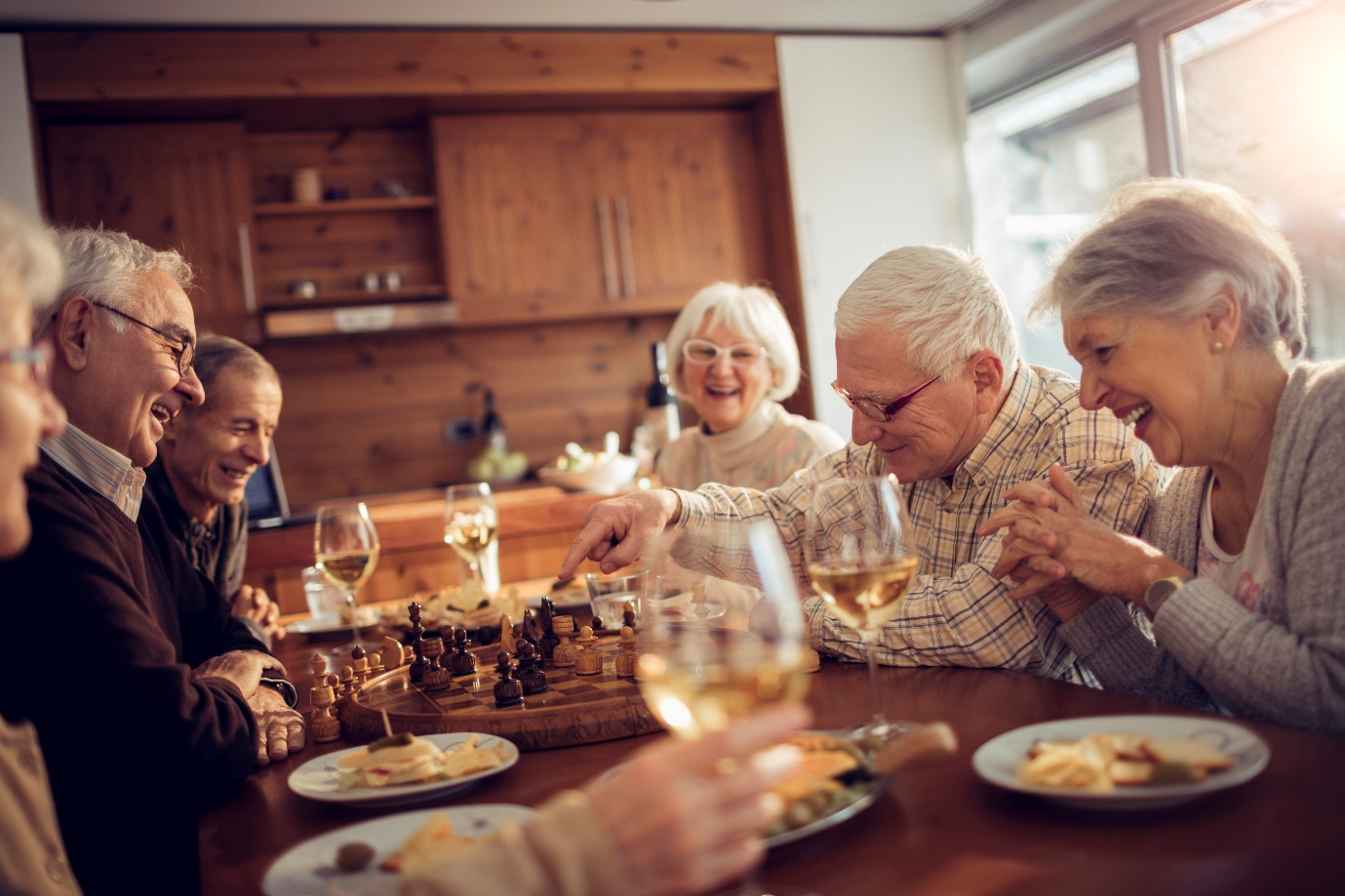 A group of senior friends having a meal 