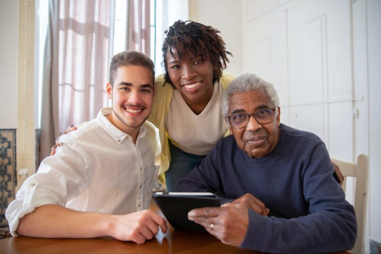 A senior adult and their caregivers at an assisted living community in St. Louis