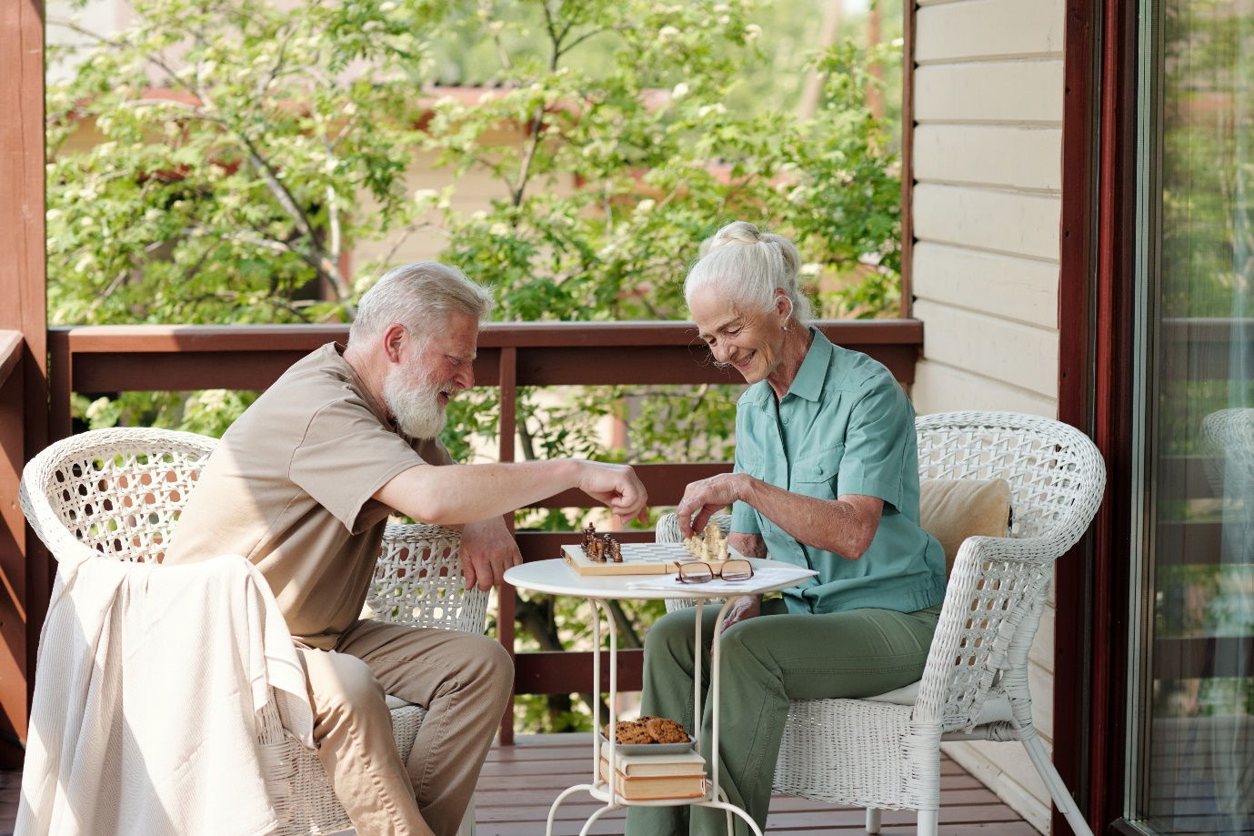  A happy senior couple playing chess