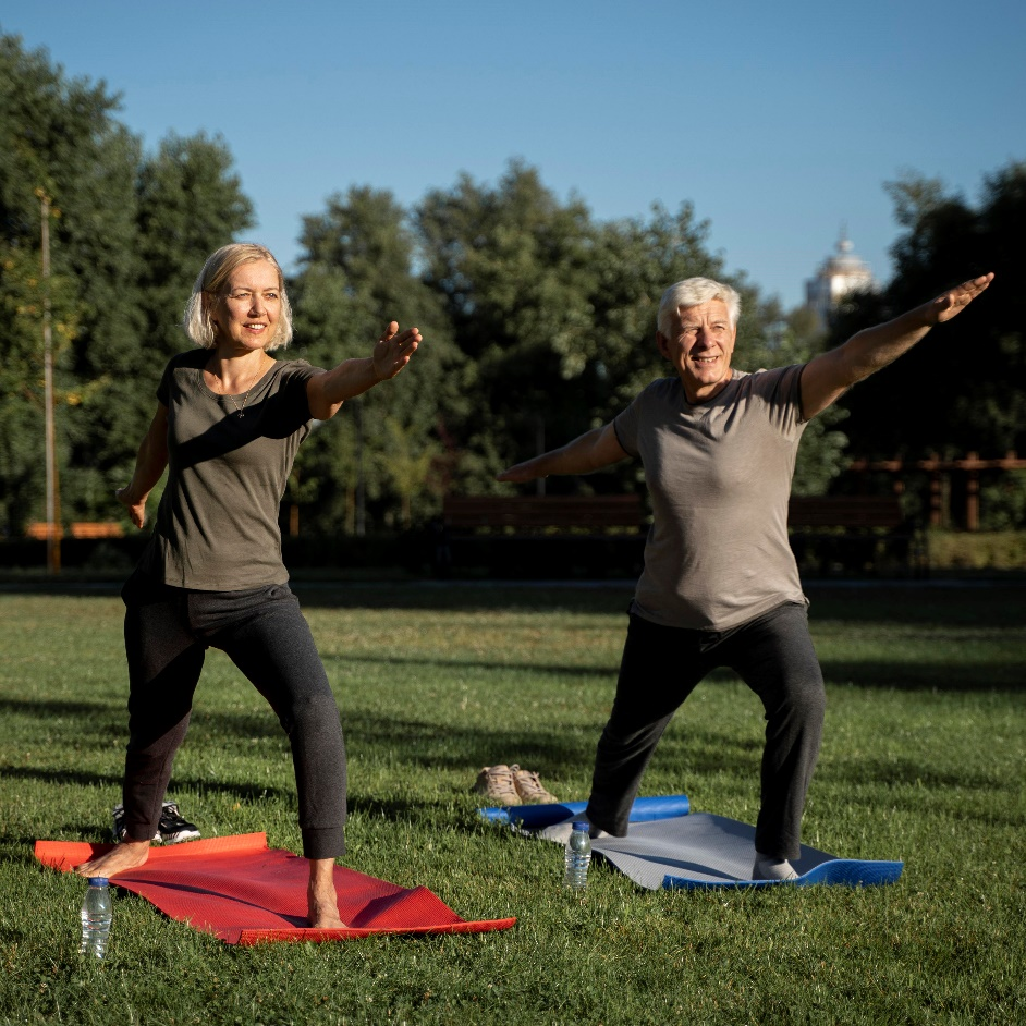  a couple exercising in a garden