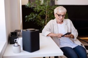 A senior working with a digital assistant