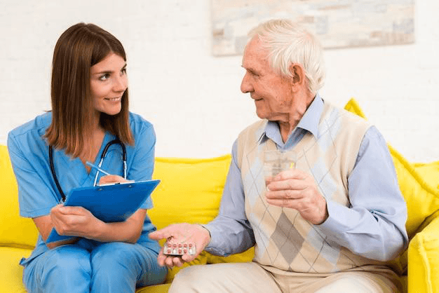 A senior talking to a nurse